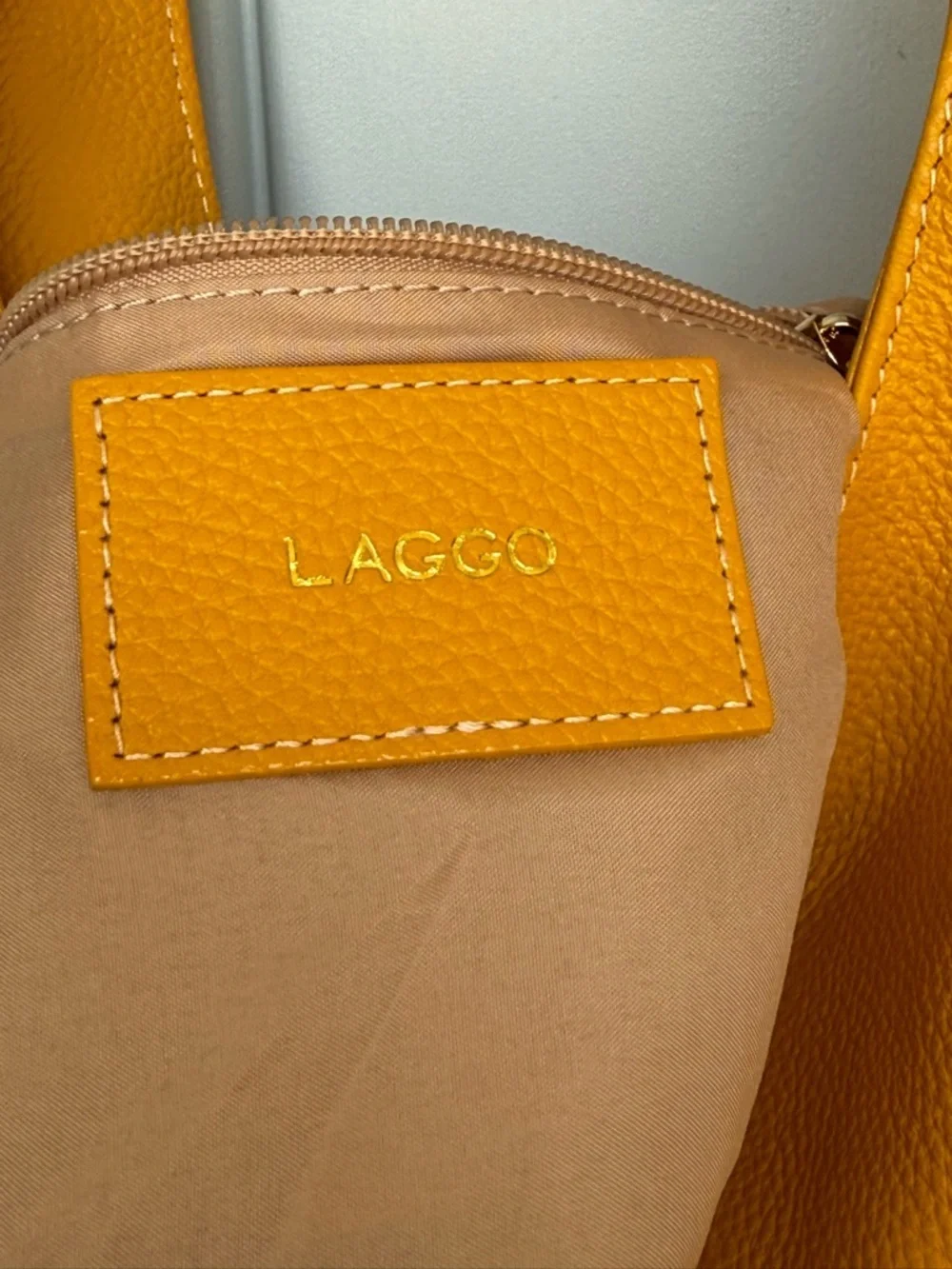 Laggo Havana hobo bag crafted from pebbled genuine leather.